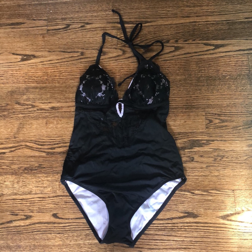 ADORE ME- Size Medium. One piece swim suite.